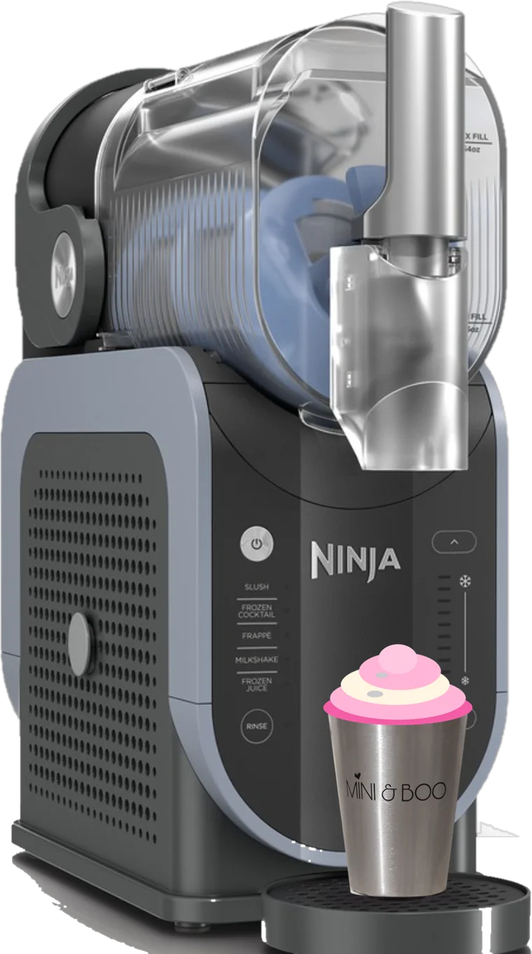 Ninja SLUSHi with a Mini & Boo stainless cup of pink slushie under the pourer